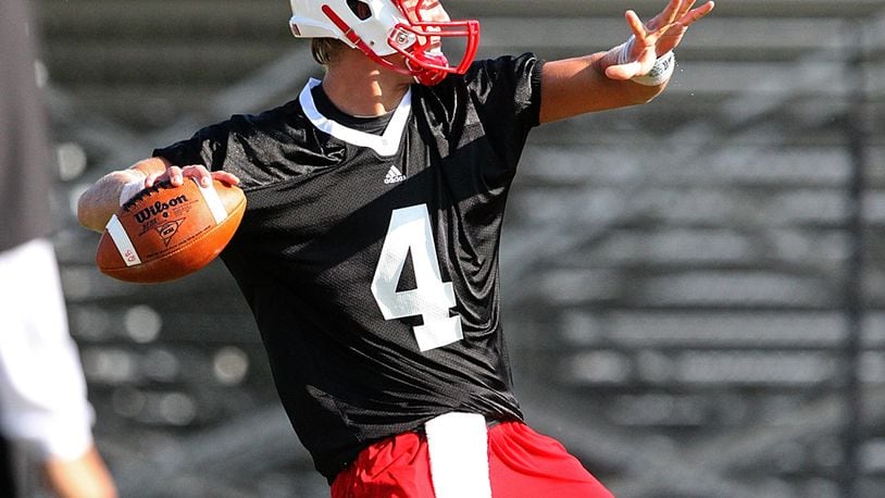 Zac Dysert (4) of the Miami RedHawks, throws a pass during the first team practice of the summer, Saturday, August 7, 2010, at Miami University, in Oxford.
