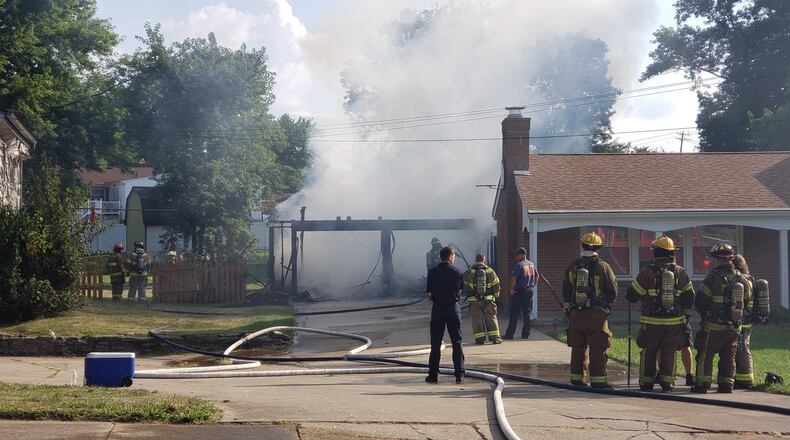 Middletown firefighters were dispatched at 8:40 a.m. to a garage fire engulfed in flames. NICK GRAHAM/STAFF