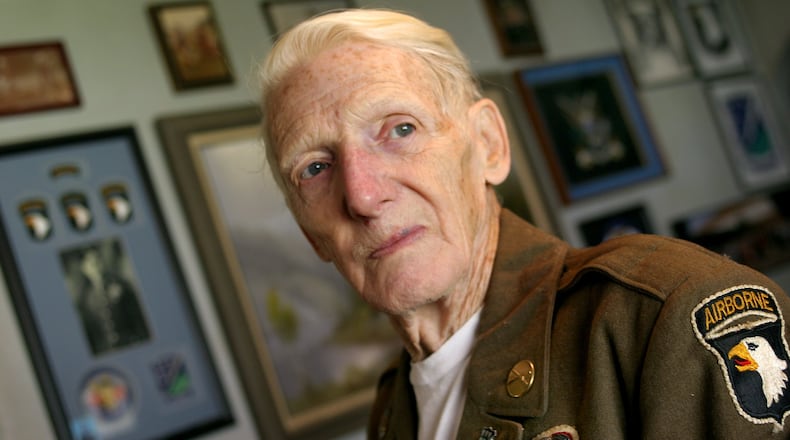 Jim Martin was a member of the 101st Airborne Division on D Day. He and his group jumped 25 miles behind enemy lines the night before the invasion under heavy German artillery fire. He also saw action in Holland, the Battle of the Bulge, and Germany, liberating a concentration camp and Hitler’s Bavarian home. He was awarded two Purple Hearts and a Bronze Star. STAFF PHOTO BY BILL REINKE.