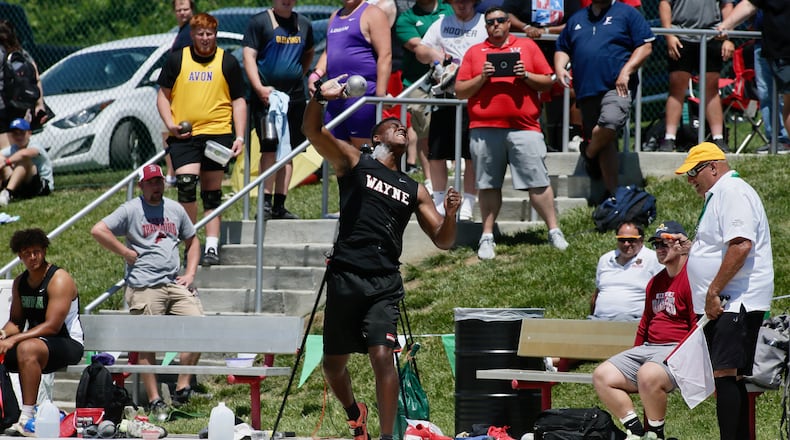 Wayne's Aamil Wagner throws the shot put at the Division I state meet on Saturday, June 4, 2022, at Jesse Owens Memorial Stadium in Columbus. David Jablonski/Staff
