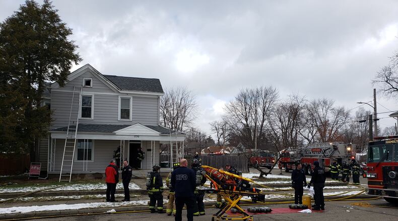 Crews responded to a house fire in the 1700 block of Edison Avenue in Hamilton on Wednesday, Dec. 18, 2019. NICK GRAHAM / STAFF