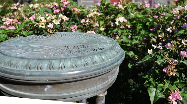 Butler County historian Kathleen Fox is working to get this sundial at Monument Park in Hamilton restored. It was dedicated in May 1941 in honor of Josephine Straub Weiler, the mother of former Hamilton newspaper columnist and writer Stella Weiler Taylor. Pictured is the sundial on Thursday, Sept. 5, 2024, without its gnomon, the piece that casts a shadow to show the time of day. It's been missing for years. MICHAEL D. PITMAN/STAFF