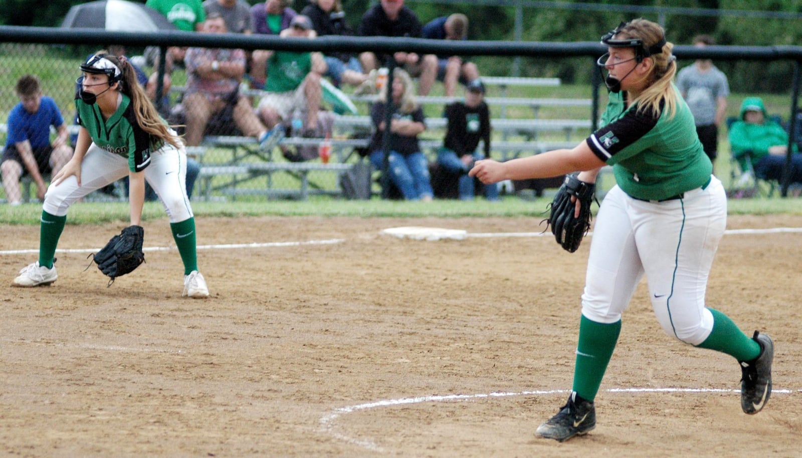 Harrison’s Emily Wisman delivers a pitch Wednesday during a 2-0 loss to Lakota West in a Division I regional softball semifinal at Centerville. RICK CASSANO/STAFF