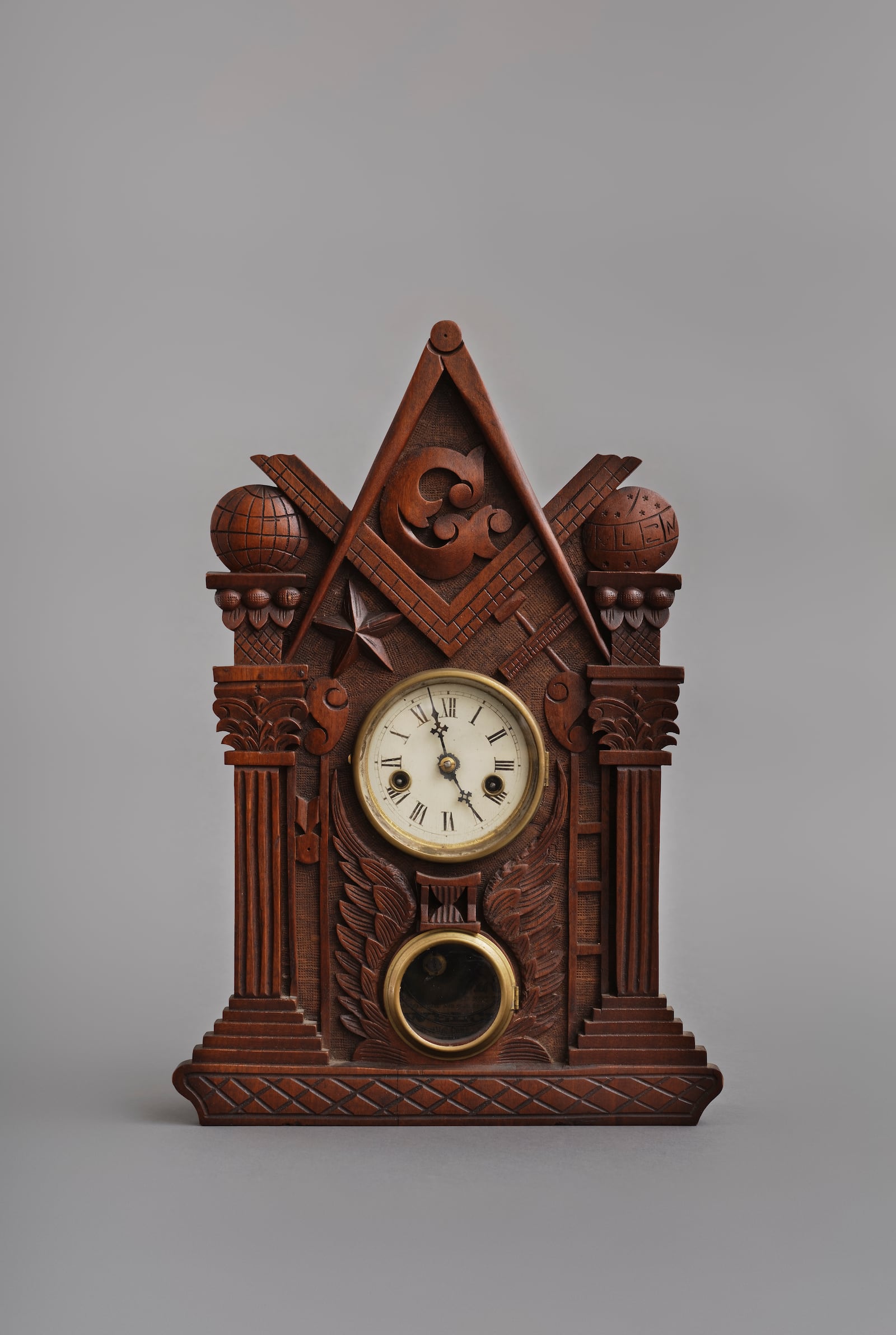 Masonic Shelf Clock. Wood, glass, and metal clock by John Haley Bellamy, c. 1870