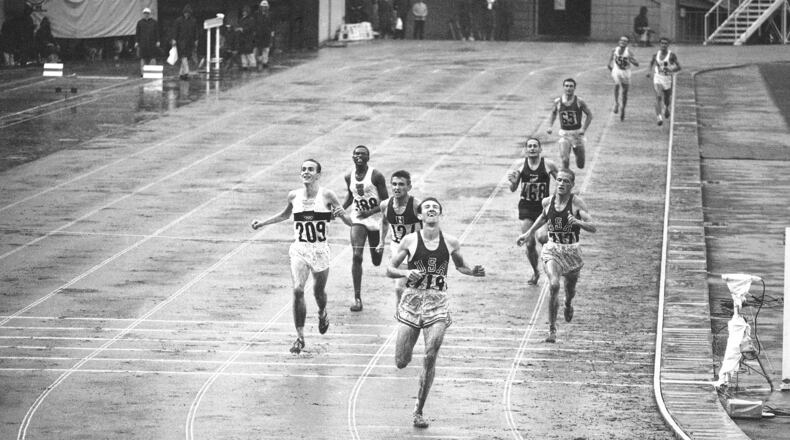 FILE - Bob Schul of West Milton, Ohio, hits the tape to win the 5,000 meter run at the Olympic Games in Tokyo Oct. 18, 1964. Schul, the only American distance runner to win the 5,000 meters at the Olympics, has died. He was 86. His death on Sunday, June 16, 2024, was announced by Miami University in Ohio, where Schul shined on the track and was inducted into the school’s hall of fame in 1973. (AP Photo)