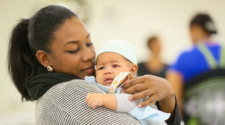 UPDATED CUTLINE FOR OHJN 112516 INFANT MORTALITY: The infant mortality rate for black babies is not improving in Butler County. Raven Smith and her son, Donald, participated this year in High Hopes, a Butler County program aimed at reducing the infant mortality rate. GREG LYNCH / STAFF