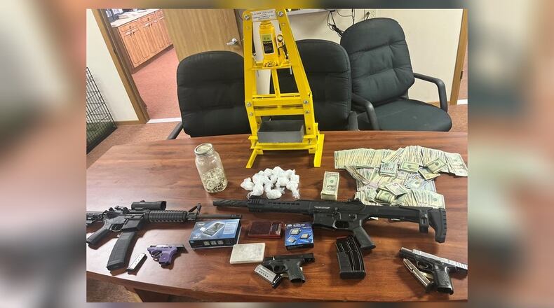 Seized during the serving of a search warrant in the 7300 block of Park Avenue in Cincinnati was 343 grams of cocaine, more than $11,000 in cash, a rifle, shotgun and three handguns. BCSO/CONTRIBUTED
