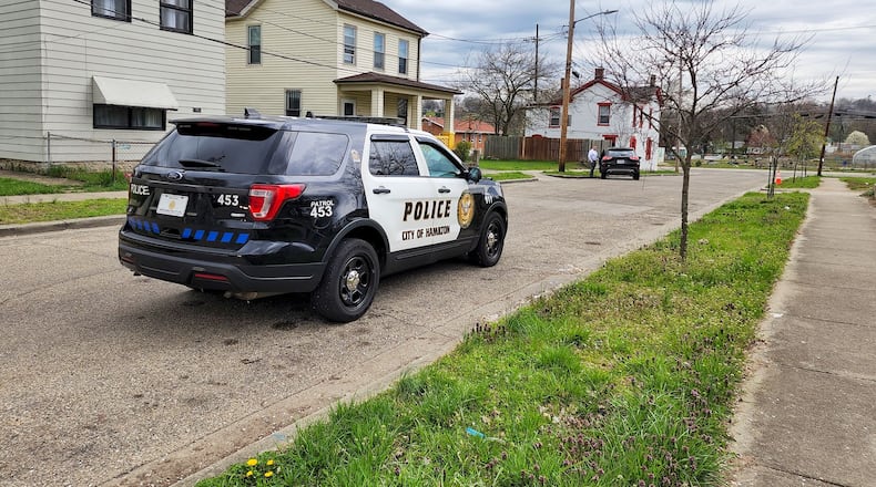 Hamilton Police on Wilson Street this morning where a man said he he was shot then drove to the police station. NICK GRAHA,/STAFF