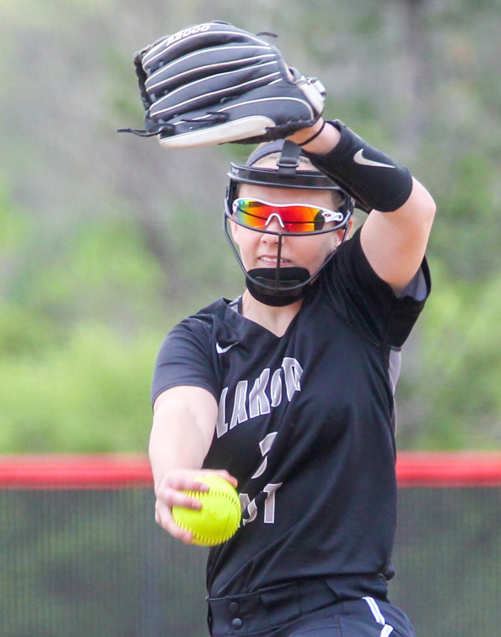 Lakota East pitcher Sydney Larson (3) delivers a pitch during Tuesday’s game at Lakota West. GREG LYNCH/STAFF