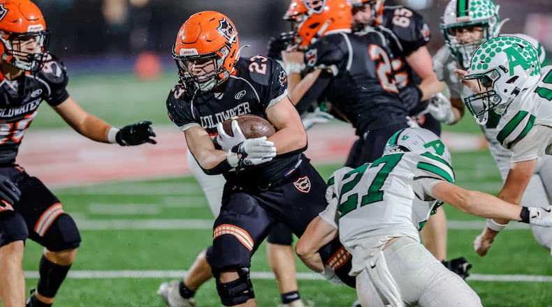 The Coldwater High School football team beat Anna 14-12 on Friday, Nov. 21 at Piqua's Alexander Stadium to win the Division III, Region 12 championship. MICHAEL COOPER / STAFF PHOTO