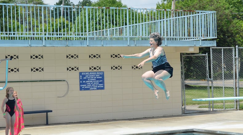 Oxford Mayor Kate Rousmaniere officially opened the pool for its final season of use with a cannonball dive. It was the third year she opened the summer season with a jump into the pool. BOB RATTERMAN/CONTRIBUTED