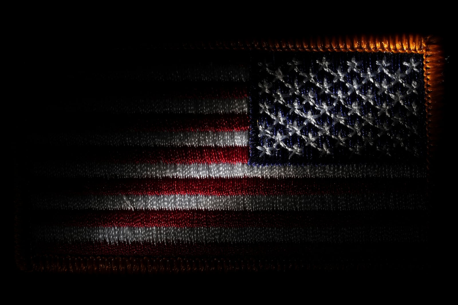 A morale patch embroidered with the United States flag is seen, Friday, June 6, 2025, in Marple Township, Pa. (AP Photo/Matt Slocum)
