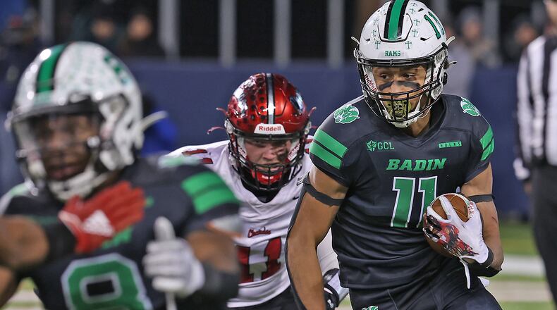 Badin's Braedyn Moore is chased by Chardon's Zoran Vujaklija in the Division III state championship game in Canton on Dec. 3, 2021. Moore is a University of Cincinnati recruit. BILL LACKEY/STAFF