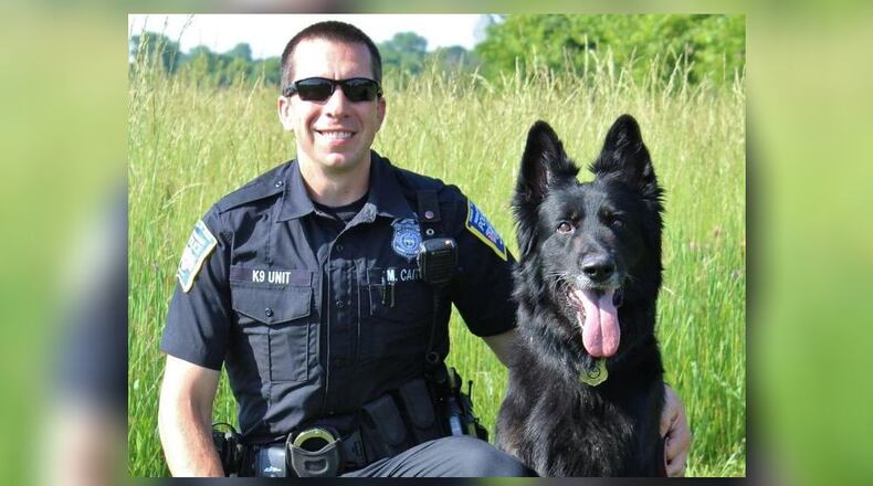 Middletown Division Of Police Officer Marco Caito and K9 Aki. MIDDLETOWN DIVISION OF POLICE