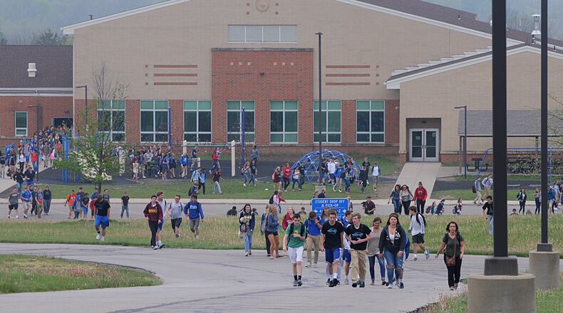 Springboro schools are among districts in Warren and Montgomery counties using social network scans for threats. Pictured is a 2016 evacuation of Springboro High School after a bomb threat.Staff photo by Marshall Gorby