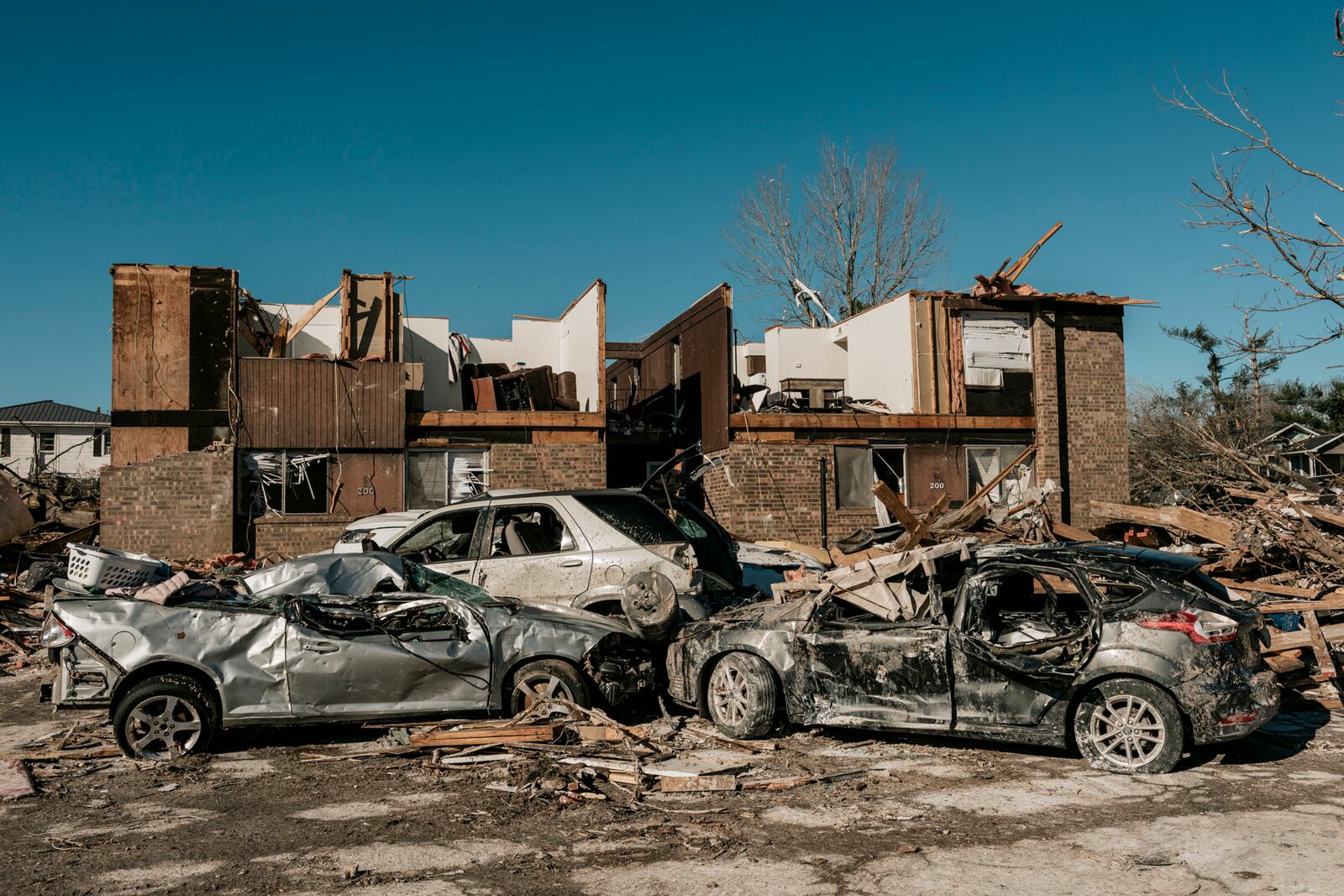 The Dawson Village Apartments in Dawson Springs, Ky., on Monday, Dec. 13, 2021, where a tornado flattened much of the town on Friday night. Determining how many people died in the tornadoes that ravaged the central U.S. on Friday has been a challenging task so far, with estimates fluctuating as search teams continue to spread out amid vast fields of rubble in an effort to rescue the living and account for the dead. (William Widmer/The New York Times)