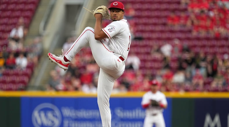 Cincinnati Reds pitcher Chase Burns delivers a pitch during the first inning of a baseball game against the Pittsburgh Pirates, Monday, March 30, 2026, in Cincinnati. (AP Photo/Kareem Elgazzar)