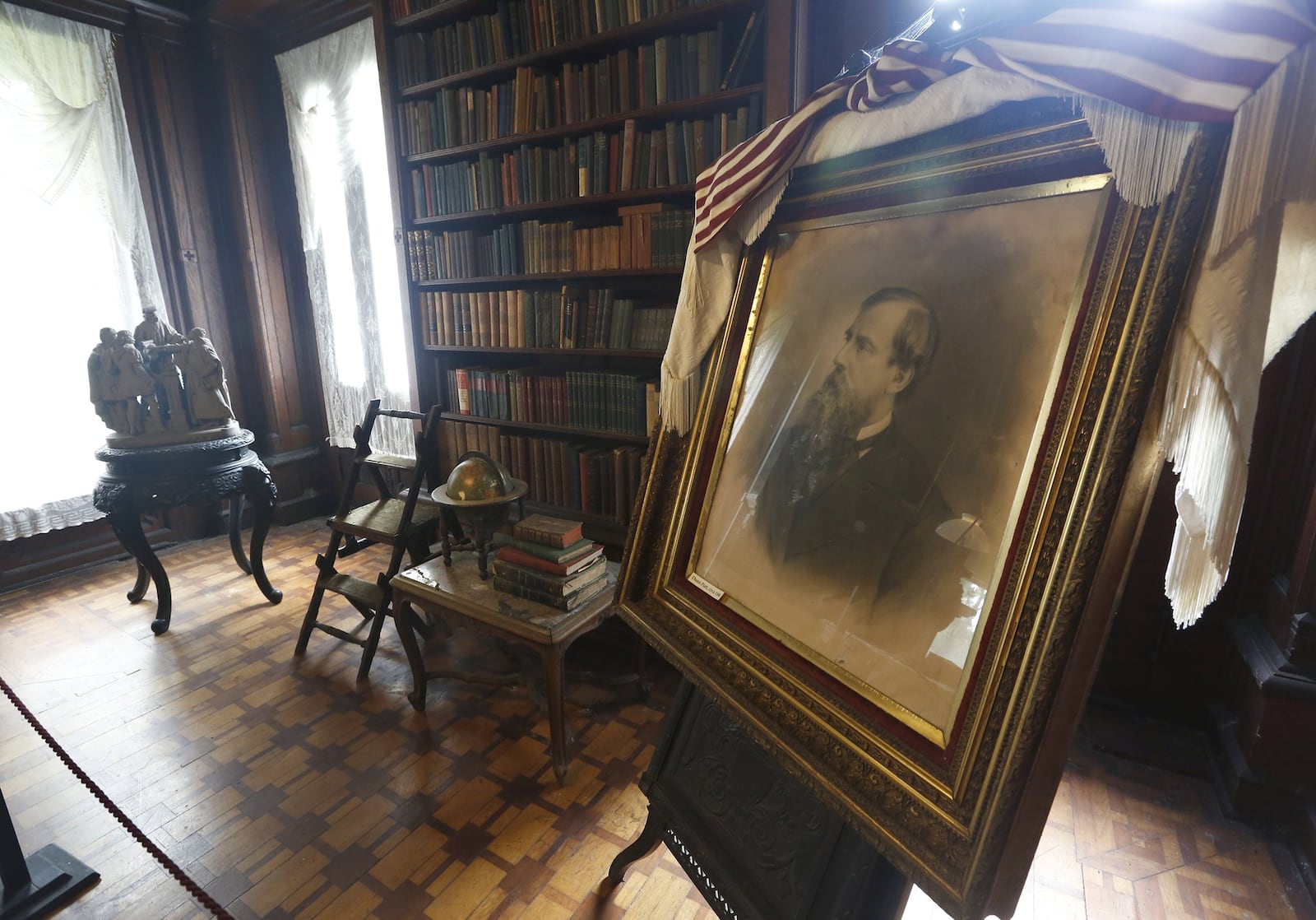 A framed portrait of Donn Piatt sits in the library of Mac-A-Cheek the home he built in West Liberty. Donn Piatt and his brother Abram built a pair of homes in Logan County called the Piatt Castles. LISA POWELL / STAFF