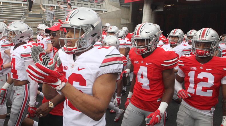Ohio State takes the field at Ohio Stadium before the spring game on Saturday, April 15, 2017, in Columbus. David Jablonski/Staff