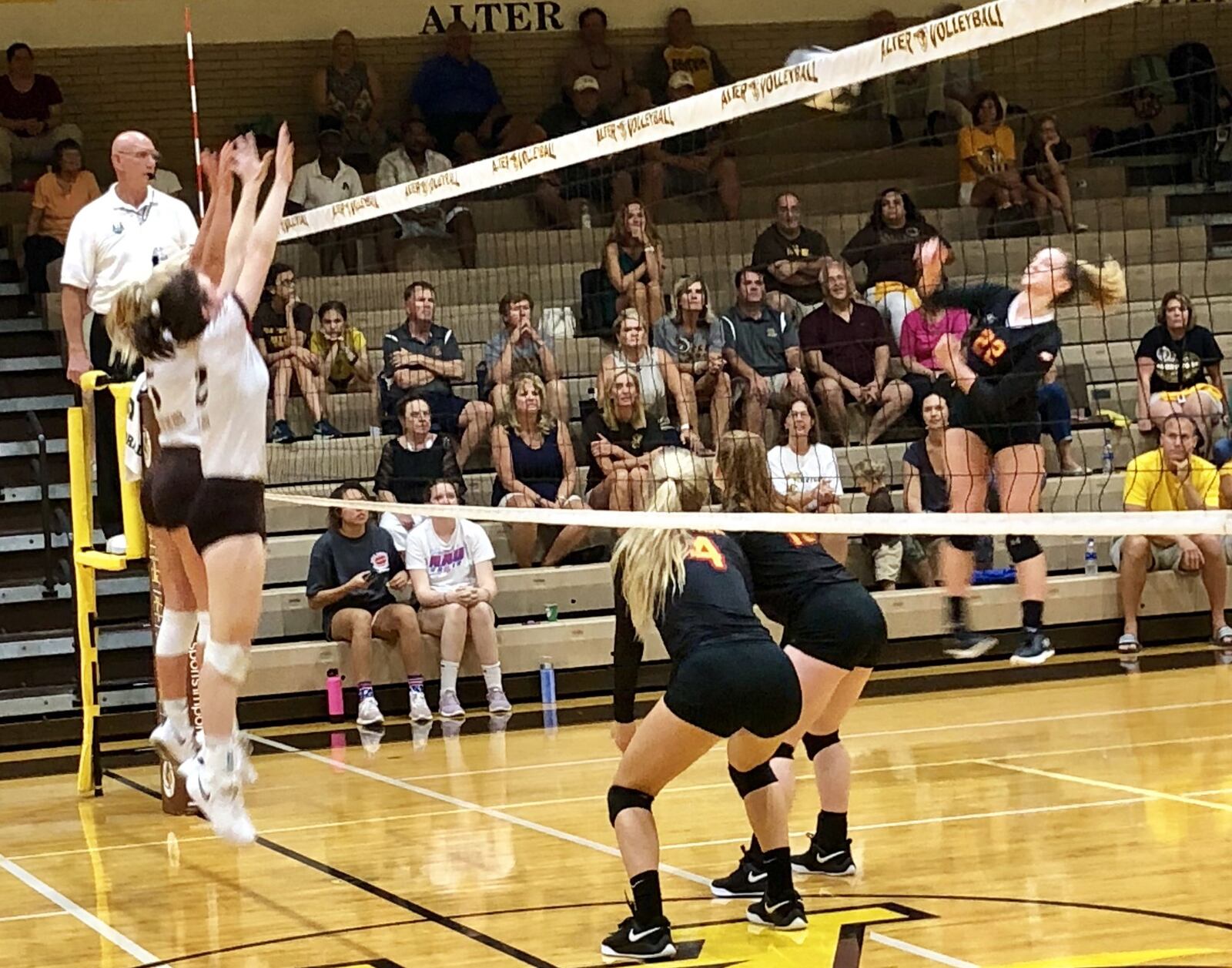 Fenwick’s Emma Schafer (22) delivers a shot toward the Alter Knights during Thursday night’s match in Kettering. Fenwick won 3-2. CONTRIBUTED PHOTO BY DEBBIE JUNIEWICZ