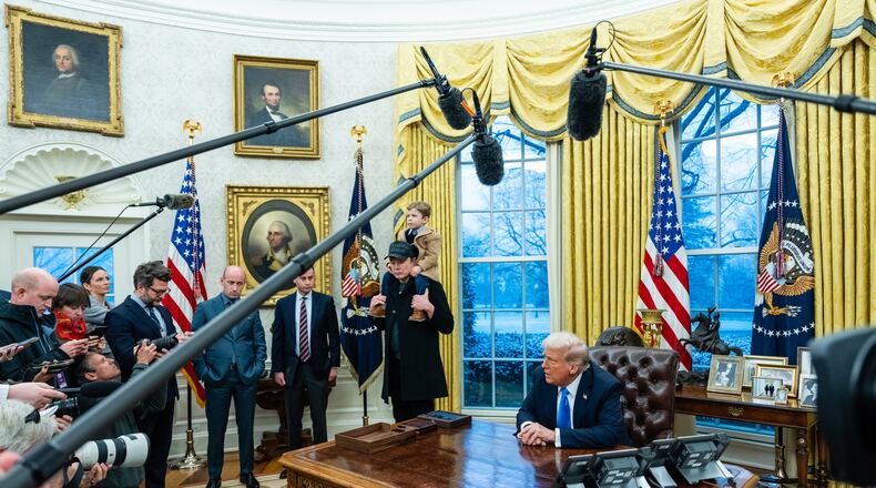 President Donald Trump and Elon Musk explain the administration’s cost-cutting efforts in the Oval Office of the White House in Washington, on Tuesday, Feb. 11, 2025. Musk has for weeks posted on social media about government spending, often amplifying and seeding false information. (Eric Lee/The New York Times)