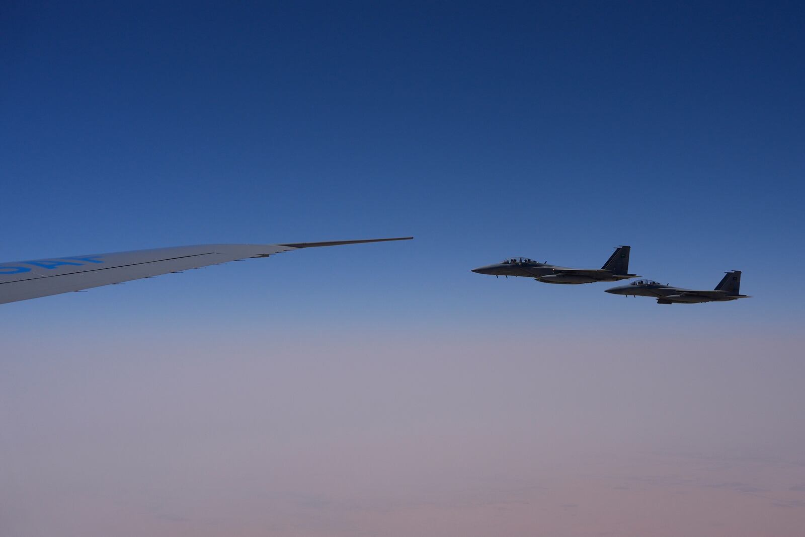 Saudi Air Force F-15 warplanes escort Air Force One carrying President Donald Trump as it arrives in Saudi Arabia, Tuesday, May 13, 2025. (AP Photo/Alex Brandon)
