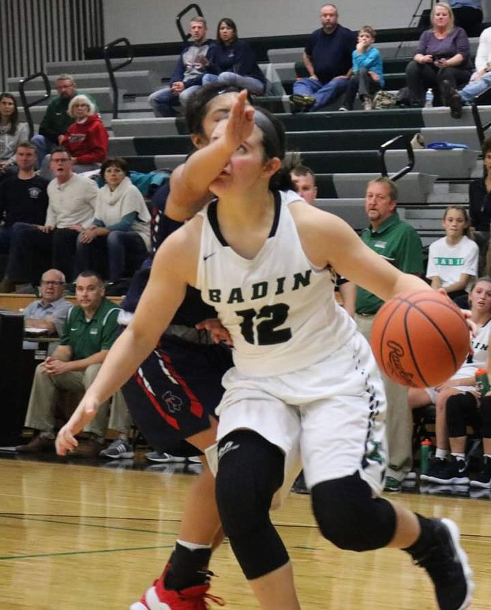 Badin’s Emma Adams (12) is defended by Talawanda’s Ava Wetzel during Wednesday night’s game at Mulcahey Gym in Hamilton. Badin earned a 79-36 win. CONTRIBUTED PHOTO BY TERRI ADAMS