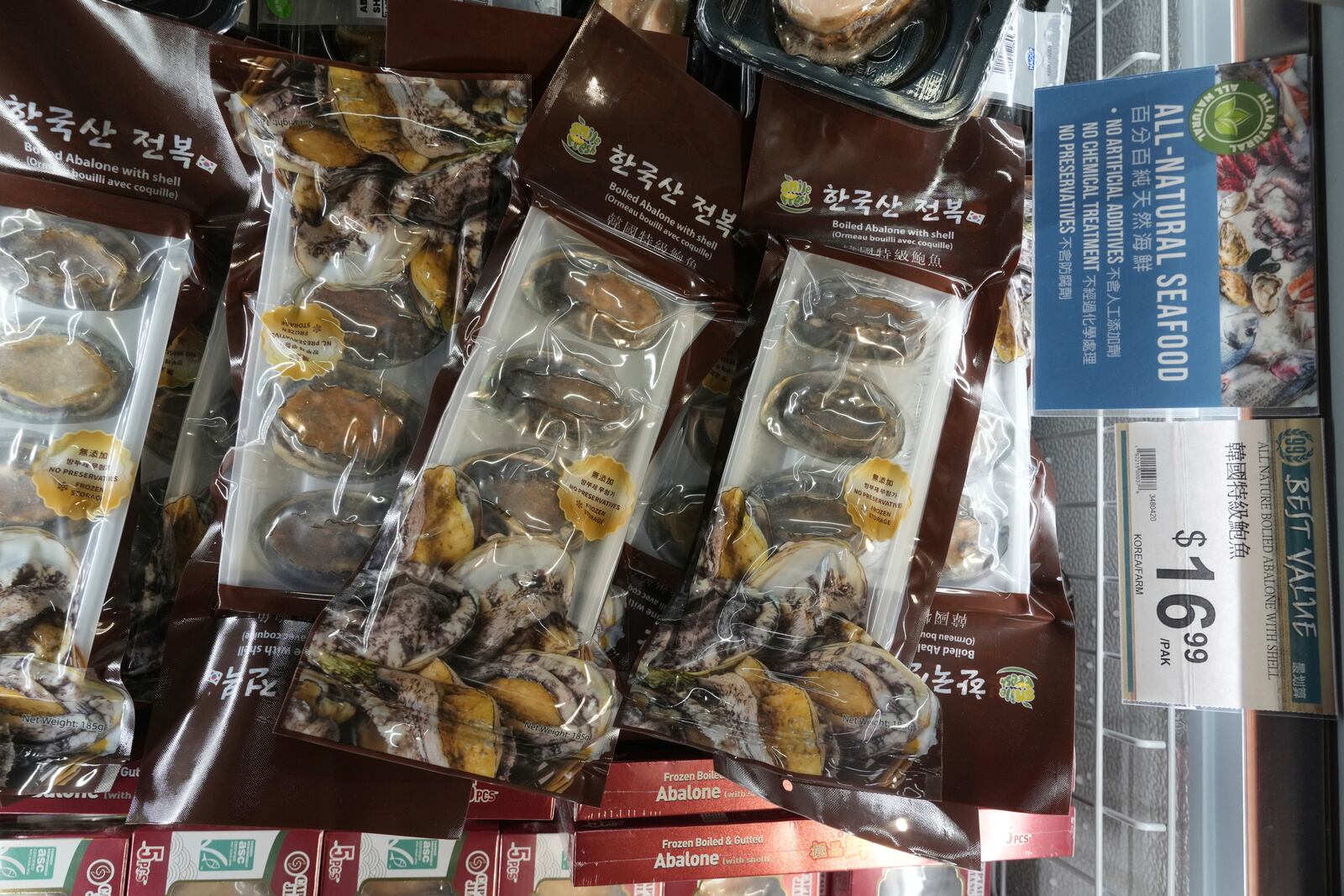 All-Natural seafood frozen Abalone imported from China is sold at 99 Ranch Market, an Asian grocery store in Los Angeles Monday, April 7, 2025. (AP Photo/Damian Dovarganes)
