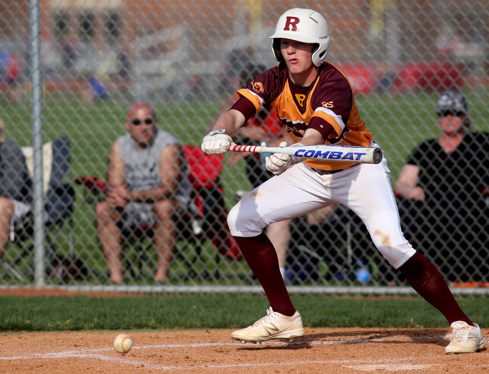 Brennan Morton of Ross lays down a bunt for a single during Wednesday’s game against visiting Edgewood. CONTRIBUTED PHOTO BY E.L. HUBBARD