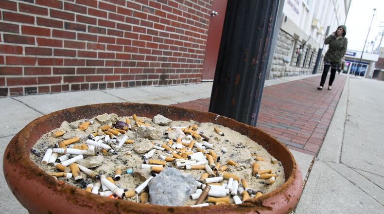 The city of Hamilton is considering banning all tobacco and e-cigarette use at all city properties and work sites, including city-owned cars and trucks, “so we don’t have folks driving around, smoking in the city vehicles,” Human Resources Director Tim Werdmann recently told City Council.