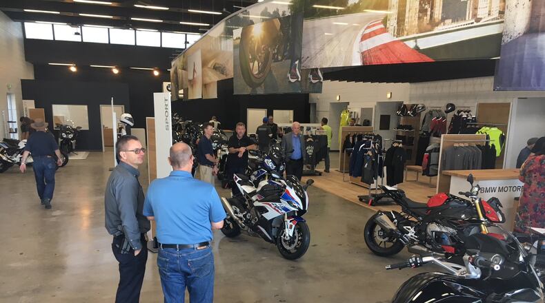 BMW Motorcycles of Greater Cincinnati held a ribbon-cutting at on Friday, June 28, 2019, for the new business at 140 N. Verity Parkway. ED RICHTER / STAFF