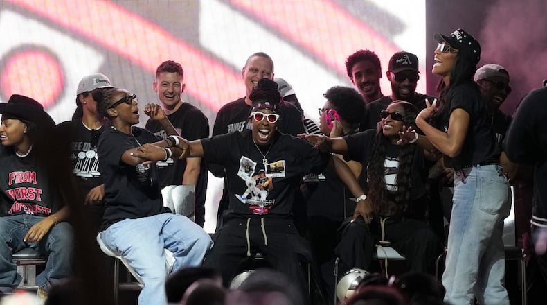 The Las Vegas Aces celebrate during a rally to celebrate the team's WNBA championship Friday, Oct. 17, 2025, in Las Vegas. (AP Photo/Candice Ward)