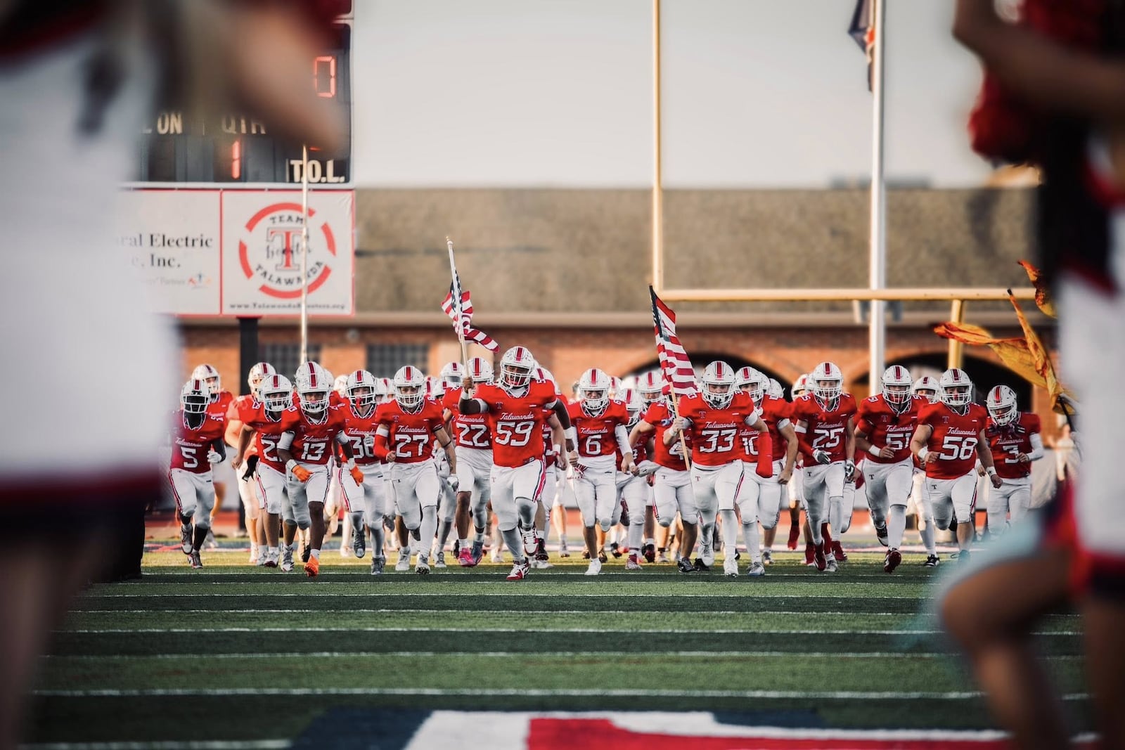 Talawanda's football team takes the field against Ross last week at Talawanda. JORDAN PHILLIPS / CONTRIBUTED
