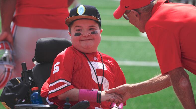 Jacob Jarvis smiles after scoring a touchdown in the Ohio State spring game on Saturday, April 15, 2017, at Ohio Stadium in Columbus. David Jablonski/Staff