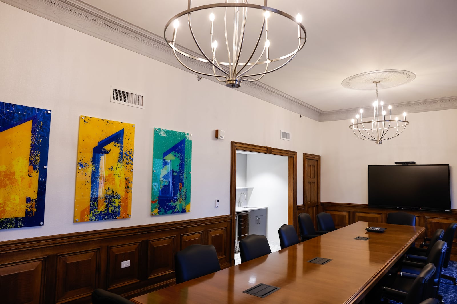 First Financial Bank is renovating its historic 300 High St. building in Hamilton, including preserving rare French wallpaper discovered during the project. The updated space will also feature a new public Community Room and a history wall highlighting the bank’s legacy. NICK GRAHAM/STAFF