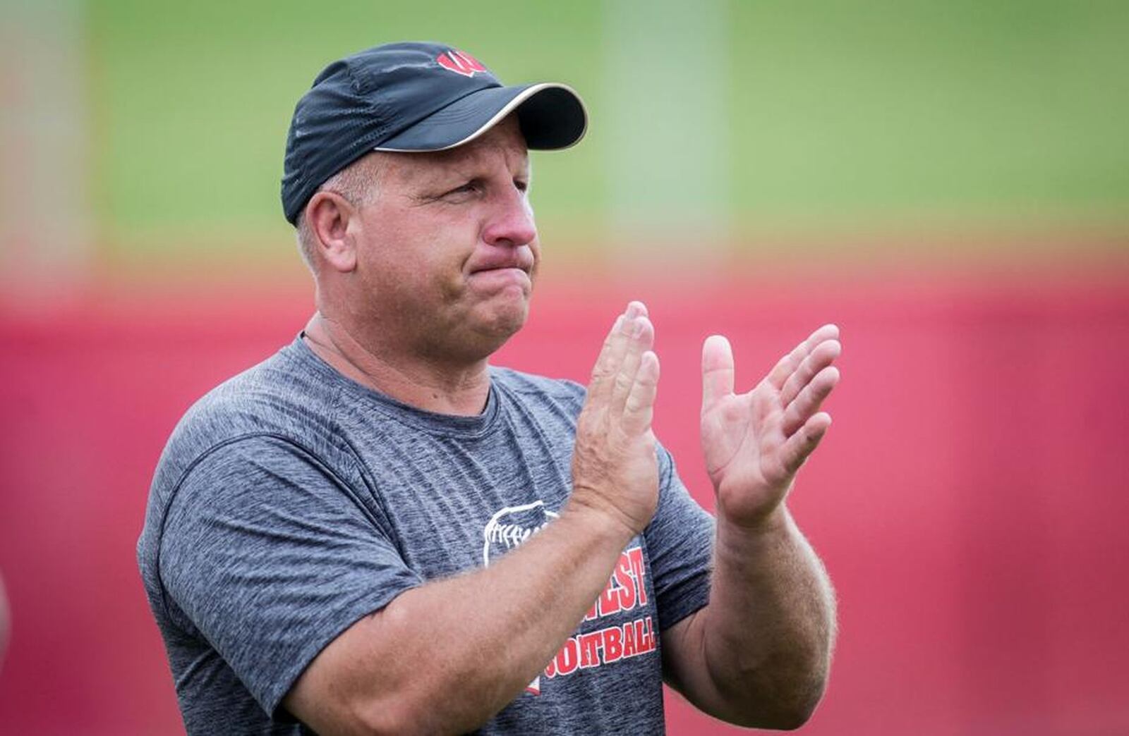 Lakota West coach Keith Castner encourages his team during the Division I state championship game against Massillon Perry on June 2 at Firestone Stadium in Akron. NICK GRAHAM/STAFF