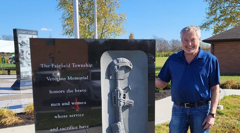 Fred Valerius stands at the Fairfield Twp. Veterans Memorial at Heroes Park, a project he helped lead for the past several years. It was dedicated two days before Veterans Day in 2023. PROVIDED