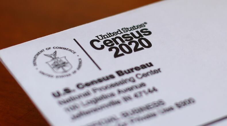 FILE - This Sunday, April 5, 2020, file photo, shows an envelope containing a 2020 census letter mailed to a U.S. resident in Detroit. A U.S. Census Bureau director couldn't be fired without cause and new questions to the census form would have to be vetted by Congress under proposed legislation which attempts to prevent in the future the type of political interference into the nation's head count that took place during the Trump administration. (AP Photo/Paul Sancya, File)