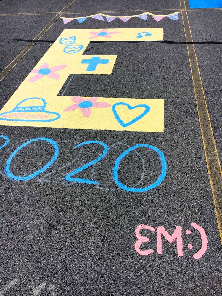 PHOTOS Lakota East seniors paint parking spots