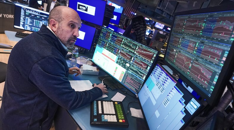 Specialist James Denaro works at his post on the floor of the New York Stock Exchange, Tuesday, Feb. 10, 2026. (AP Photo/Richard Drew)