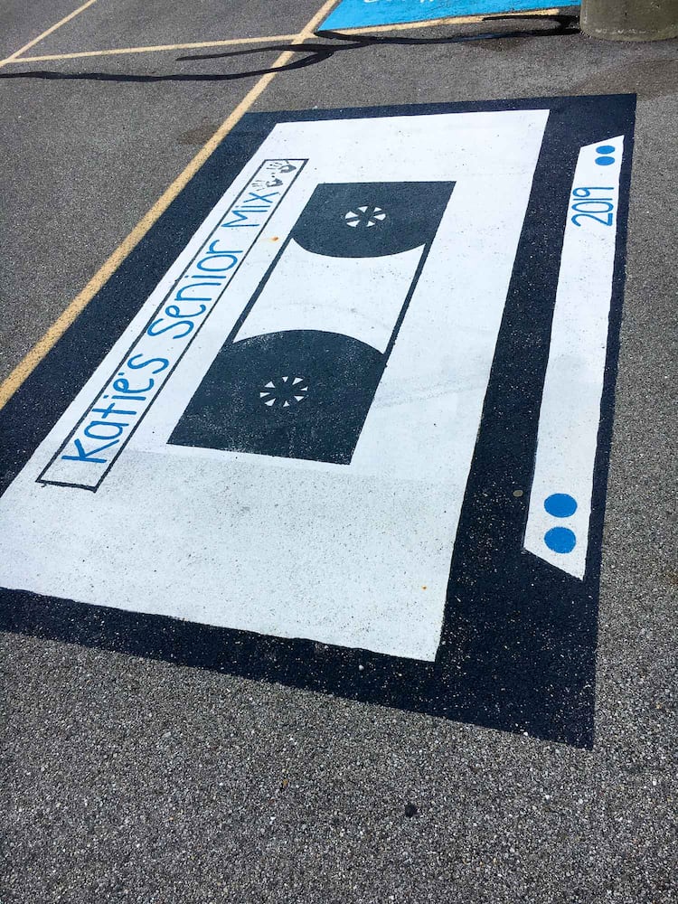 PHOTOS Lakota East seniors paint parking spots