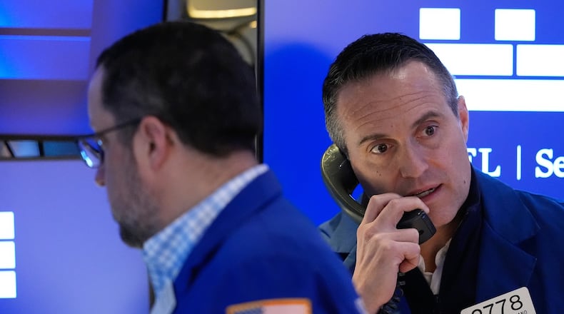 Michael Gagliano works on the floor at the New York Stock Exchange in New York, Friday, March 6, 2026. (AP Photo/Seth Wenig)