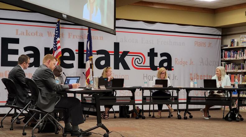 The coming end of 2022 marks the fourth consecutive school year partially or entirely impacted by the COVID-19 pandemic but while the reverberations of the virus remain, this year saw other major school issues arise to the forefront. But 2022 also marked the greatest return to near normalcy in area schools since the onset of the virus in March 2020. Lakota Schools, however, saw its most contentious year in many as controversy surrounded Superintendent Matt Miller (foreground).
(Photo By Nick Graham\Journal-News)