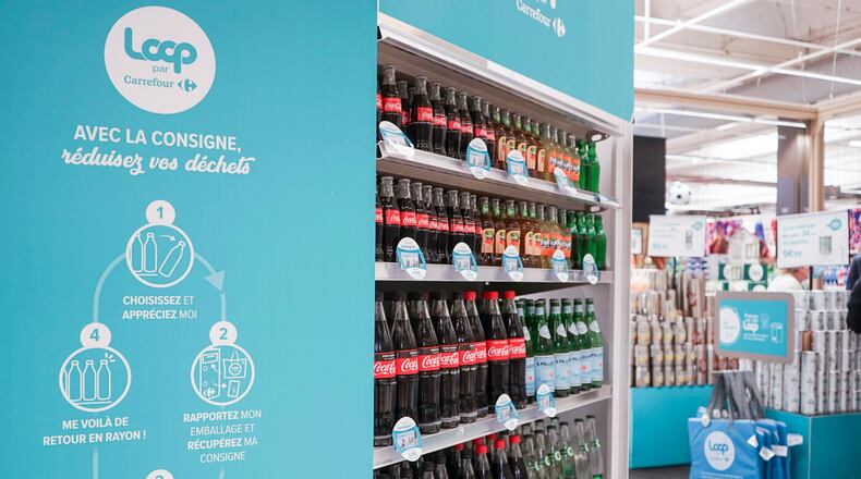 This photos provided by North America Public Relations shows Loop reusable packaging at French supermarket. Reusable packaging is about to become more common at groceries and restaurants worldwide. Loop, which collects and sanitizes reusable containers, said Wednesday, Sept. 22, 2021 it’s expanding after successful trials in France and Japan. Kroger and Walgreens in the U.S., and Tesco in the United Kingdom are among the groceries partnering with Loop. McDonald’s, Burger King and Tim Hortons have also signed on. (North America Public Relations via AP)