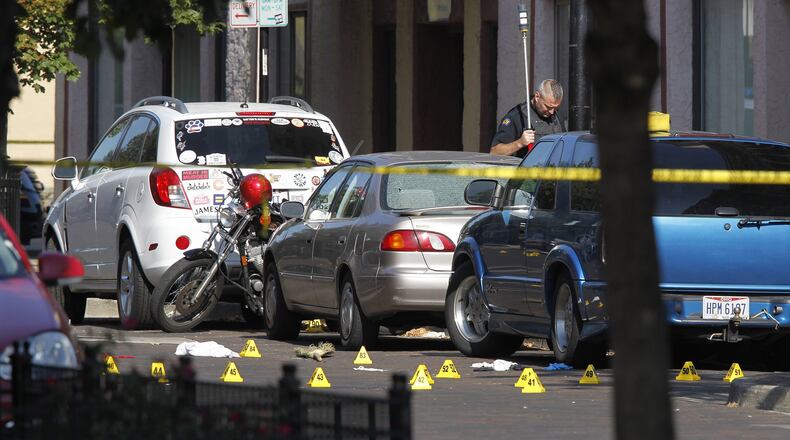 Scene in the Oregon District where 10 people were killed, including the shooter, in a mass shooting that also injured more than two dozen others. The shooting took place in the 400 block of East Fifth Street at 1:07 a.m. TY GREENLEES / STAFF