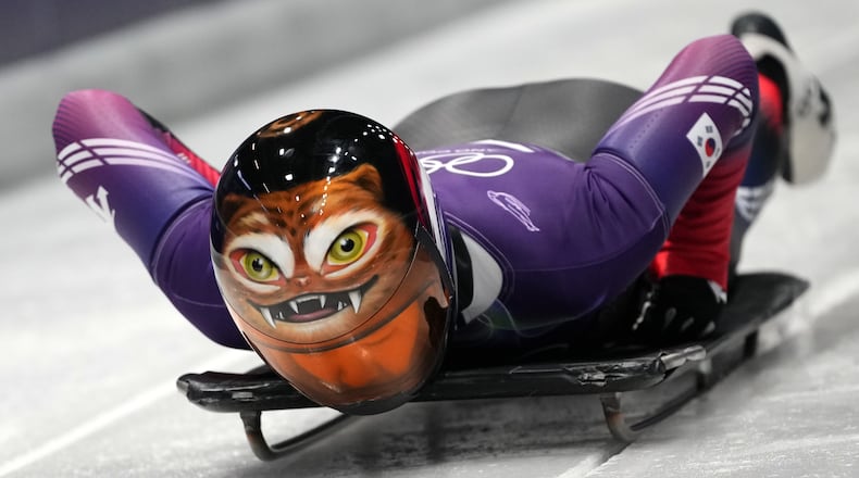 South Korea's Hong Sujung starts for a women's skeleton training session at the 2026 Winter Olympics, in Cortina d'Ampezzo, Italy, Monday, Feb. 9, 2026. (AP Photo/Alessandra Tarantino)