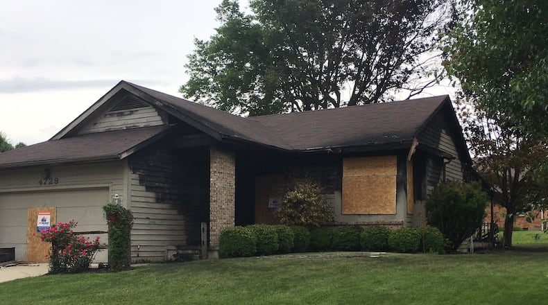 Middletown firefighters are continuing their investigation into an early morning house fire on Wednesday. Investigators said they have not determined a cause as of late Wednesday afternoon and have not ruled out arson. Five people escaped from the burning house and no firefighters were injured in the blaze. However, a family pet died in the fire. ED RICHTER/STAFF