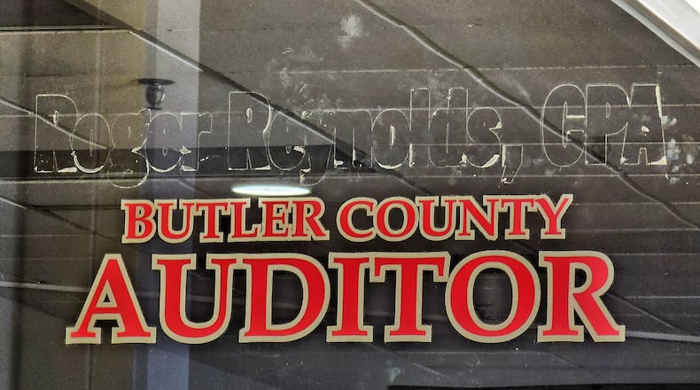Roger Reynolds name was removed from the door of the Butler County Auditor's Office on High Street in Hamilton after he was convicted of a felony in December 2022. NICK GRAHAM/STAFF