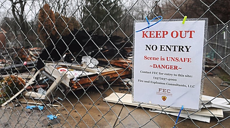 The site of a fatal house explosion on North Claridge Drive in Kettering is fenced in while the investigation into the cause is ongoing. MARSHALL GORBY/STAFF