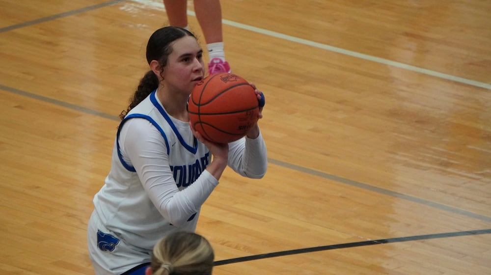 Cincinnati Christian’s Kaylin Davis eyes a free-three attempt during her game against Middletown Christian on Monday night at CCS. CHRIS VOGT / CONTRIBUTED